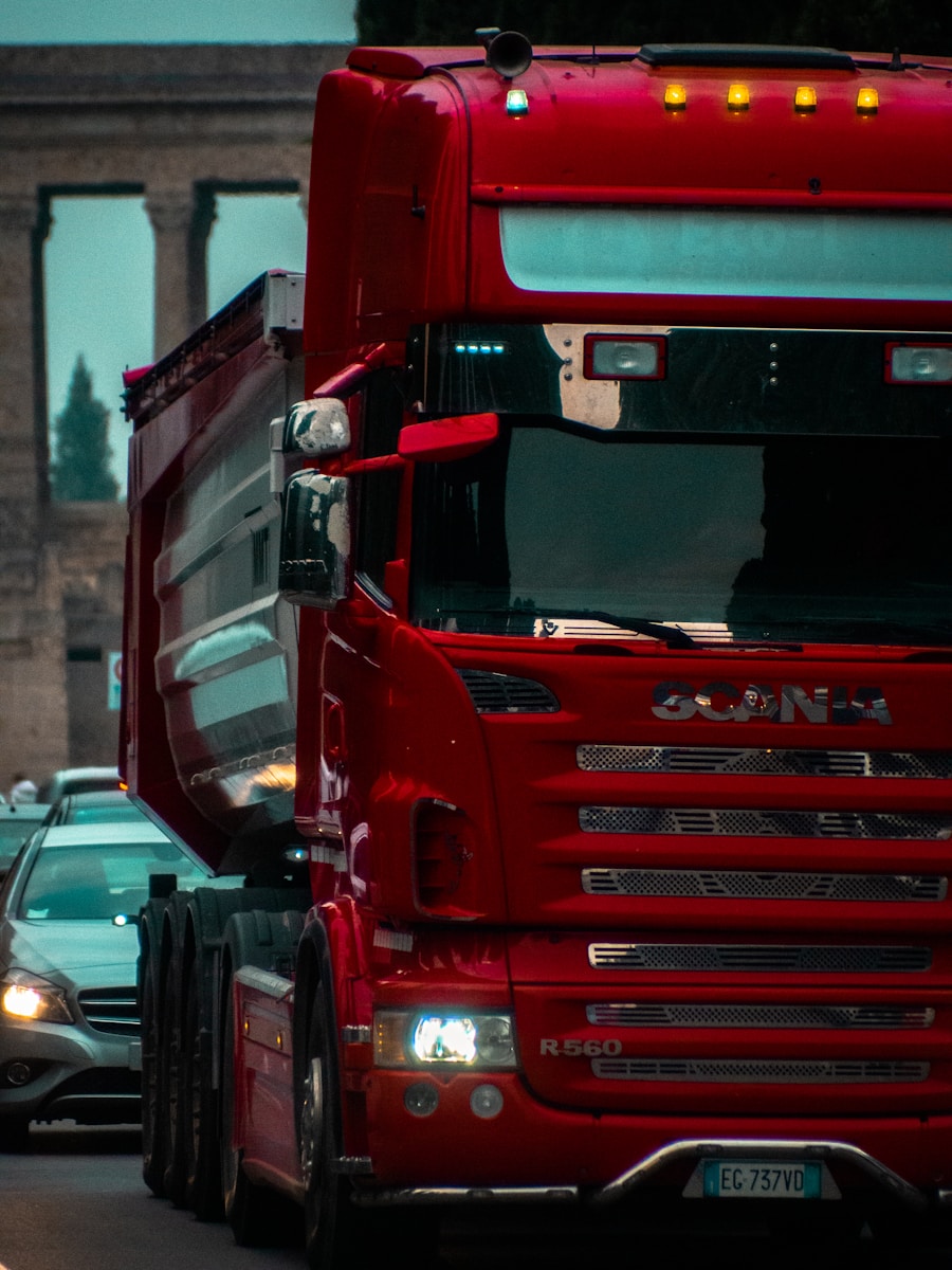 red truck on road during daytime red truck on road during daytime